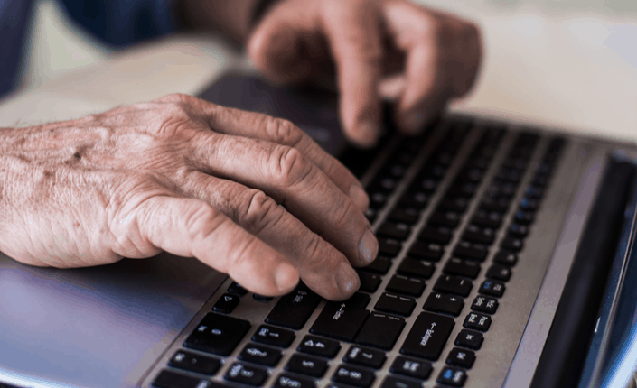 elderly senior old digital laptop work online computer 1 9